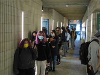 Students walking in a hall