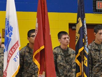 MJROTC Students with flags