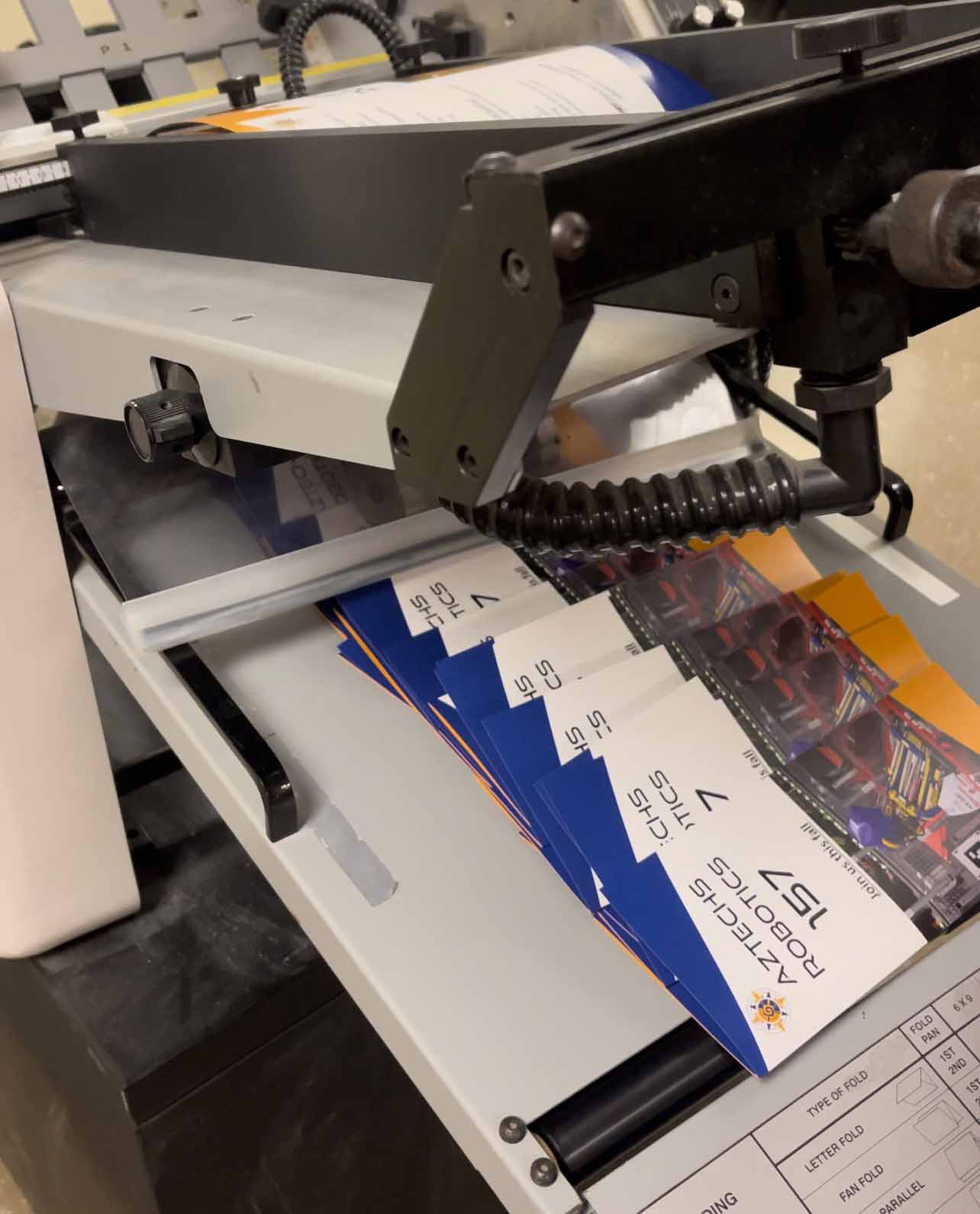Brochures on a large scale printer 