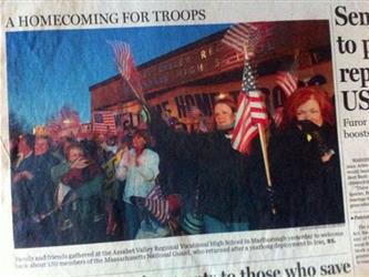 A photo of a newspaper article featuring Assabet students
